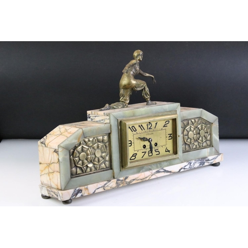 177 - An Art Deco marble and green onyx mantle clock with female figure to the top, the clock face marked ... 