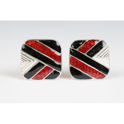 222 - Pair of silver and enamel set cufflinks