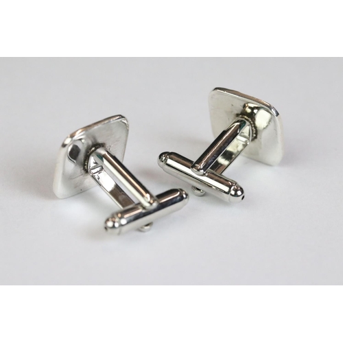 222 - Pair of silver and enamel set cufflinks