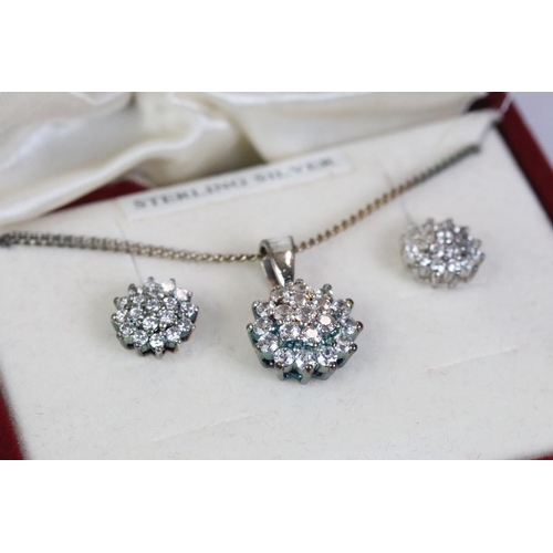 225 - Sterling silver flower pendant and earring set