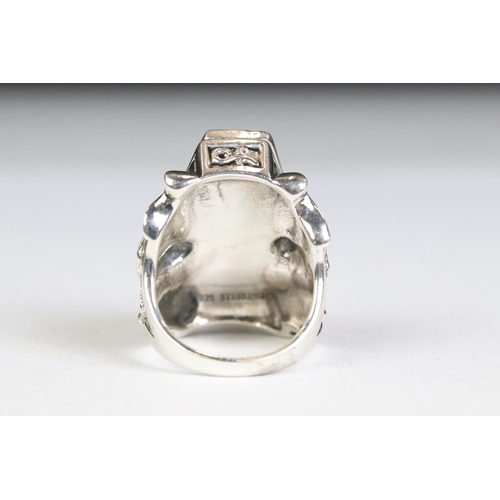 227 - Silver ring in the form of a coffin with attached skeleton