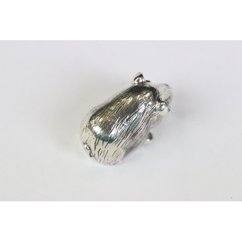 231 - Silver guinea pig figure with ruby eyes