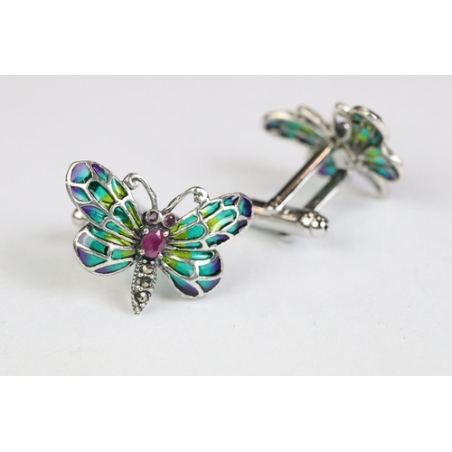 235 - Cased pair of silver butterfly cufflinks set with ruby cabochons