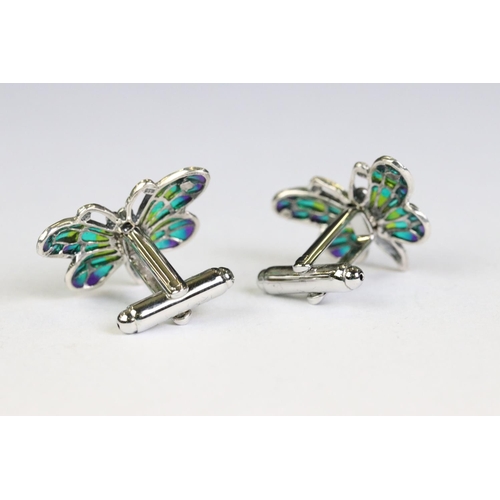 235 - Cased pair of silver butterfly cufflinks set with ruby cabochons