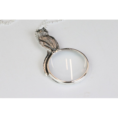 236A - Silver pendant necklace in the form of a magnifying glass with cat finial