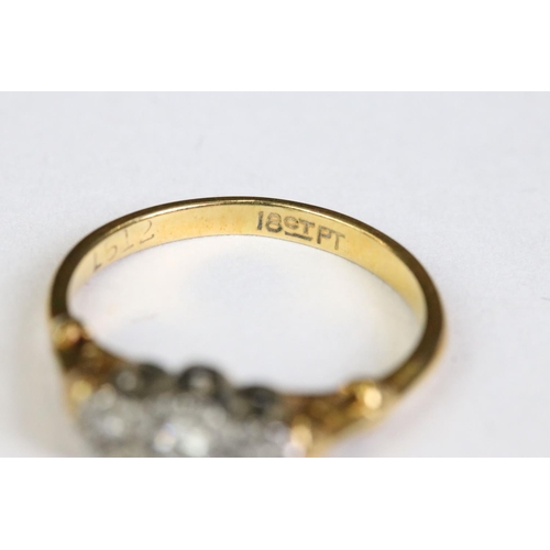 246 - A ladies 18ct gold and diamond ring together with an eternity ring.