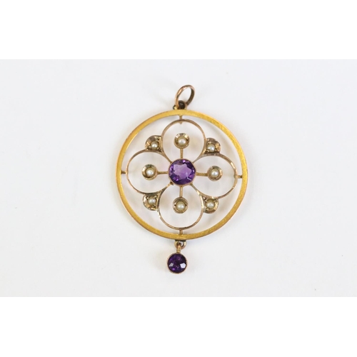 247A - A early 20th century art nouveau 9ct gold pendant and necklace decorated with seed pearl and amethys... 