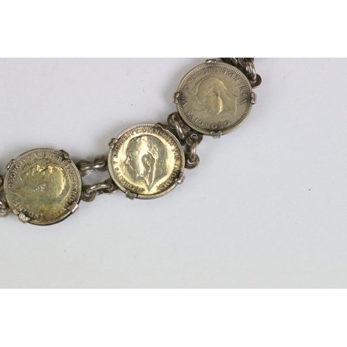 253 - A silver coin bracelet mounted with King George V threepence coins together with a sterling silver b... 