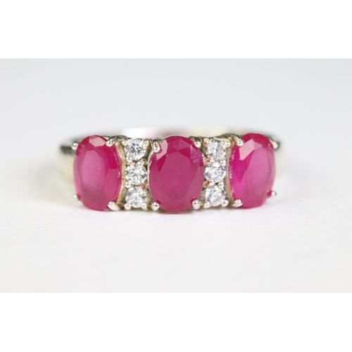 255 - Silver and CZ rubellite five stone ring