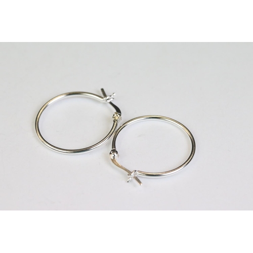 257 - Two pairs of silver hoop earrings