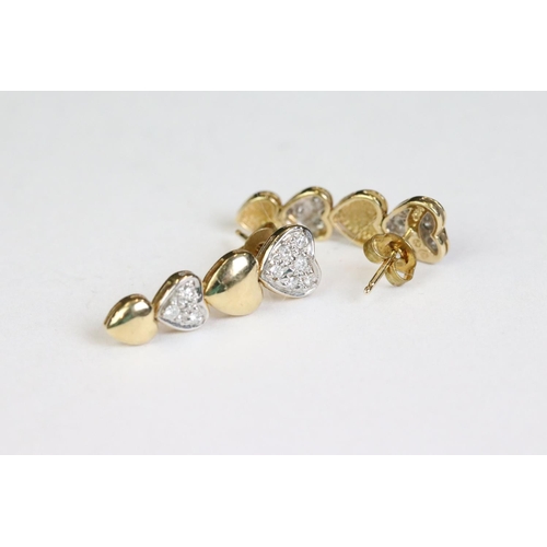 258 - Pair of 14ct yellow gold and diamond heart shaped drop earrings