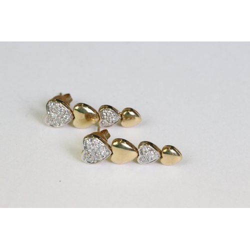 258 - Pair of 14ct yellow gold and diamond heart shaped drop earrings