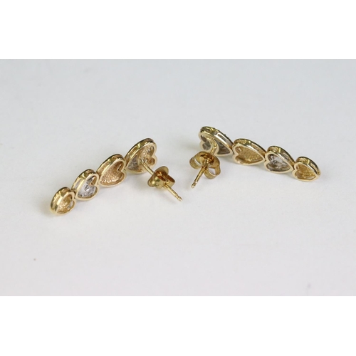 258 - Pair of 14ct yellow gold and diamond heart shaped drop earrings