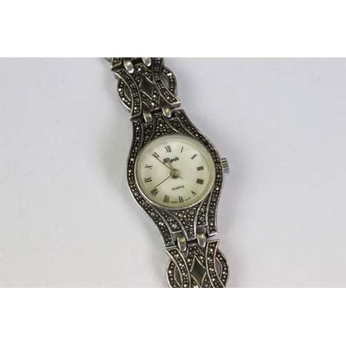 262 - A ladies silver and marcasite deco style wristwatch together with silver jewellery and designer cost... 