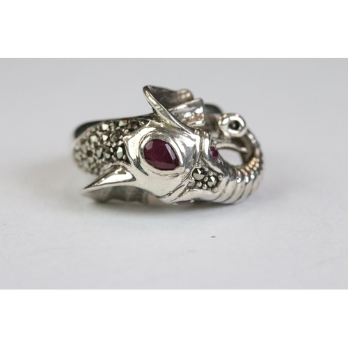 267 - Silver elephant style ring set with ruby eyes