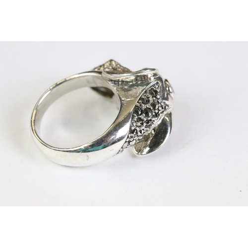 267 - Silver elephant style ring set with ruby eyes