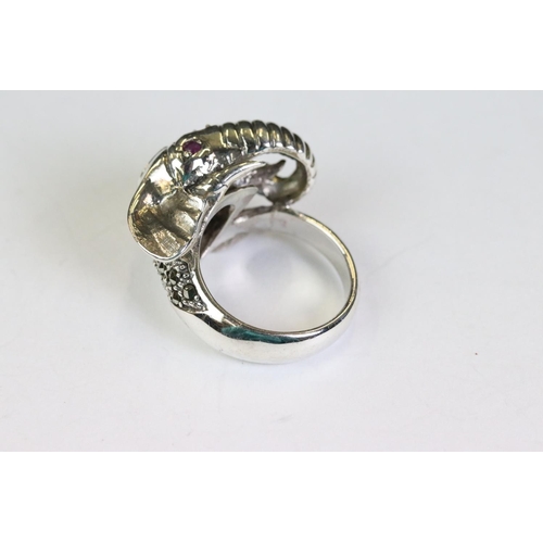 267 - Silver elephant style ring set with ruby eyes