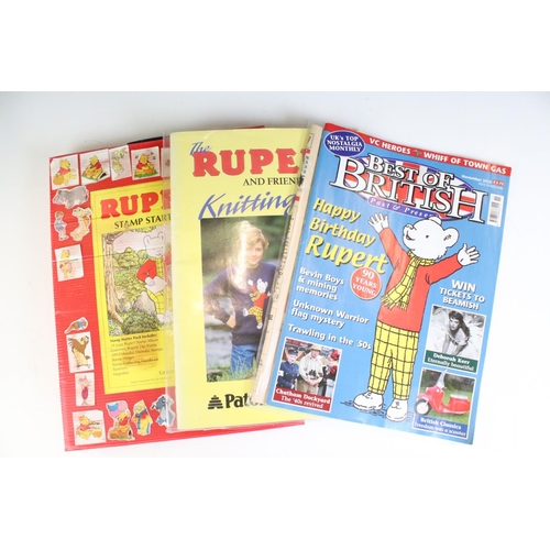 380 - Group of Rupert The Bear related collectables, to include books, mug, poster, Christmas Tree ornamen... 