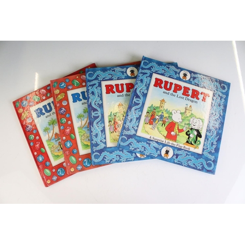 380 - Group of Rupert The Bear related collectables, to include books, mug, poster, Christmas Tree ornamen... 