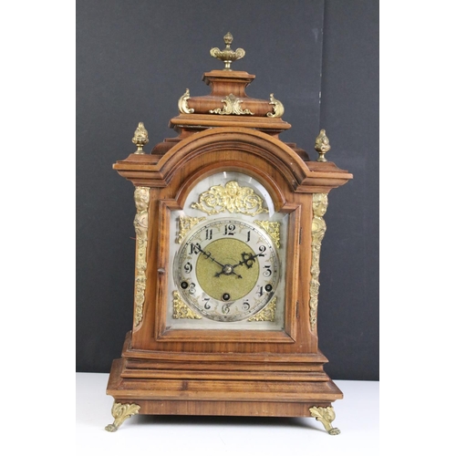 386 - A 20th century German made mantle clock with chiming movement together with a French mahogany cased ... 