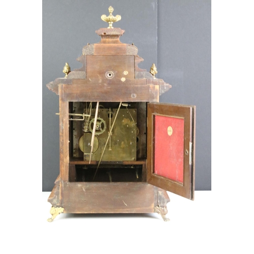 386 - A 20th century German made mantle clock with chiming movement together with a French mahogany cased ... 