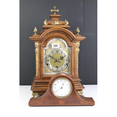 386 - A 20th century German made mantle clock with chiming movement together with a French mahogany cased ... 