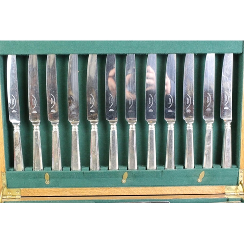 394 - A canteen of silver plated Sheffield flatware / cutlery with presentation plaque to the top.