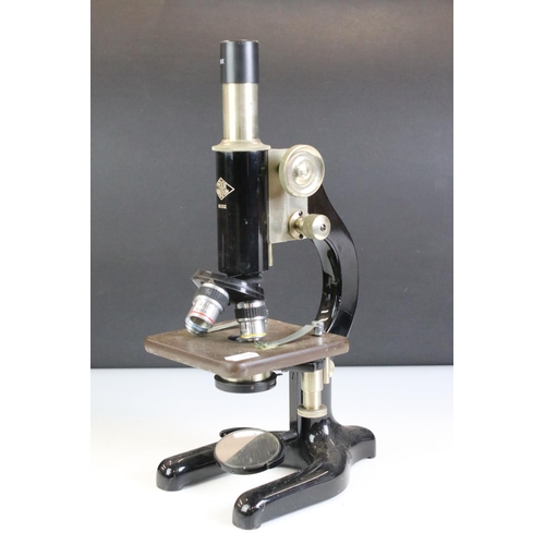 398 - Two vintage microscopes to include a Prior London and a cased Senior example.