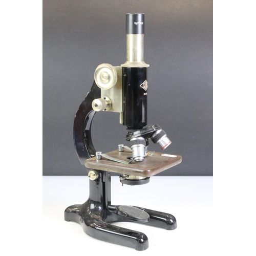 398 - Two vintage microscopes to include a Prior London and a cased Senior example.