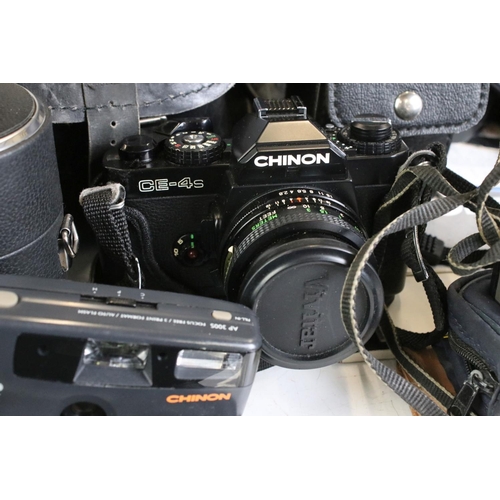 399 - A small collection photographic equipment to include a Chinon 35mm SLR camera, Lenses, filters....et... 