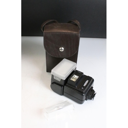 399 - A small collection photographic equipment to include a Chinon 35mm SLR camera, Lenses, filters....et... 