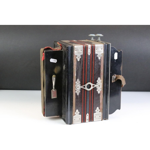 401 - A Chromatik Jubilee Melodeon universal accordion together with a military bugle badged to the Royal ... 