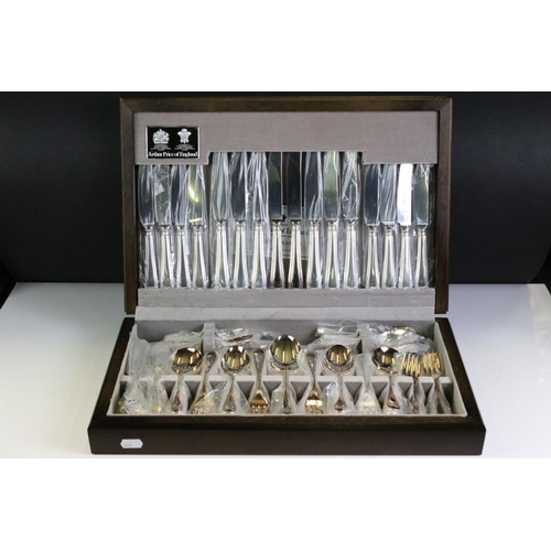 404 - Arthur Price silver plated canteen of cutlery together with two silver plated pheasants and a quanti... 