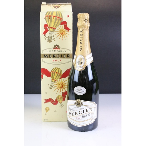 417 - A collection of three bottles of Champagne to include Mercier Brut, Mumm Cordon Vert and Drappier Br... 