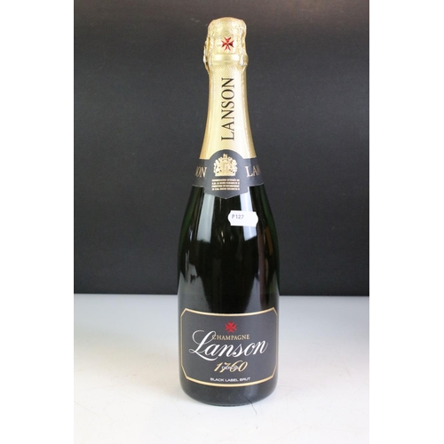 418 - A collection of six bottles of Champagne to include Lanson, Laurent Perrier and Dom Perignon example... 