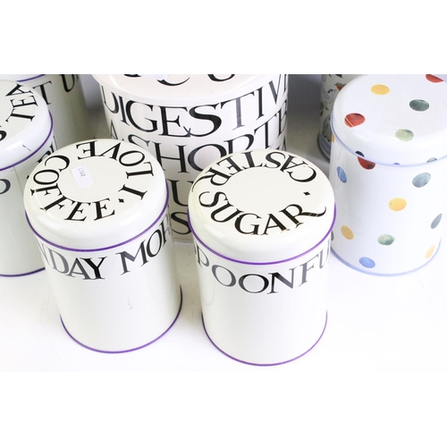 414 - A collection of six Emma Bridgewater tin storage jars together with a biscuit barrel.