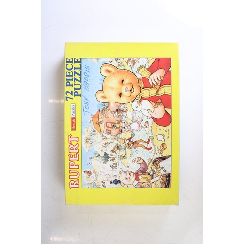 415 - Eight Rupert The Bear related jigsaw puzzles, unchecked for completeness