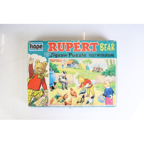 415 - Eight Rupert The Bear related jigsaw puzzles, unchecked for completeness