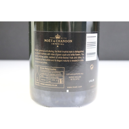 422 - A boxed bottle of Moet & Chandon Moet Imperial 150th anniversary together with a miniature bottle of... 