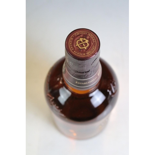 423 - A bottle of Courvoisier V.S. Cognac together with a bottle of Remy Martin V.S.O.P. and a bottle of 1... 