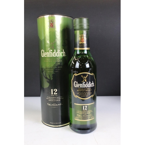 426 - A collection of four boxed bottles of Glenfiddich whisky.