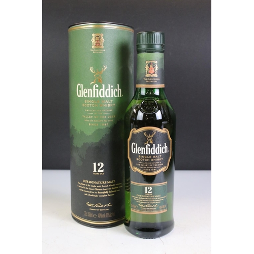 426 - A collection of four boxed bottles of Glenfiddich whisky.