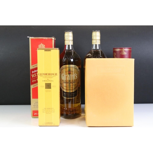 428 - A collection of six bottles of whisky to include Grants, Glenmorangie and Johnnie Walker examples.