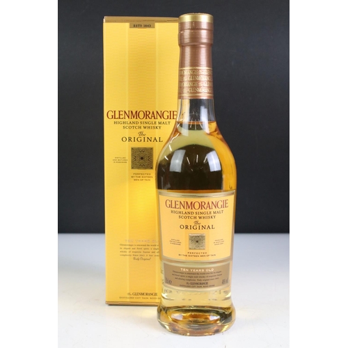 428 - A collection of six bottles of whisky to include Grants, Glenmorangie and Johnnie Walker examples.