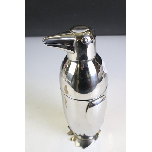 435 - Art Deco style Penguin Cocktail Shaker, 23cm high together with ' Twenty Golden Greats Frank Sinatra... 