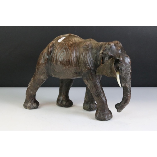 460 - Small Brown Leather Liberty style Rhino together with Four other Leather covered Animals including K... 