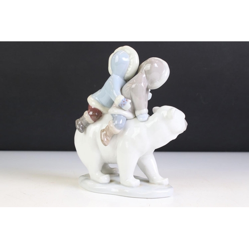 77 - Lladro Porcelain Eskimo Riders, model no. 5353, 18cm high