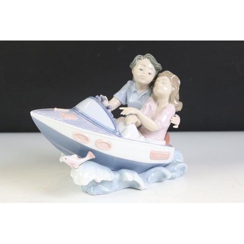 79 - Lladro Porcelain Figure Group titled ' Riding the Waves ' model no. 5941, 16cm high