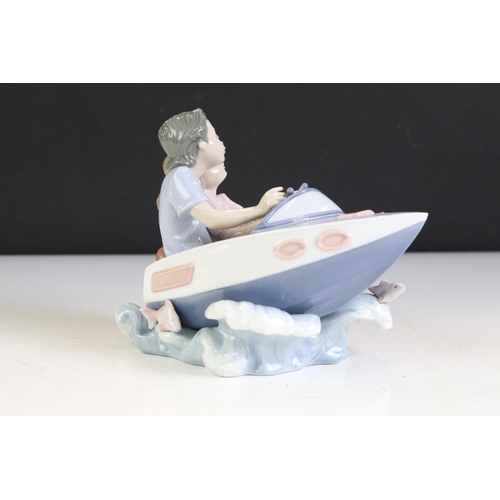 79 - Lladro Porcelain Figure Group titled ' Riding the Waves ' model no. 5941, 16cm high