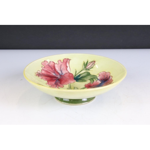 80 - Moorcroft Pottery Bowl decorated in the Hibiscus pattern on a pale green ground, Walter Moorcroft pa... 